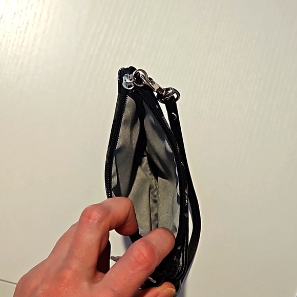 Coach black and silver Signature C wristlet with front pocket and hang tag - Picture 4 of 7